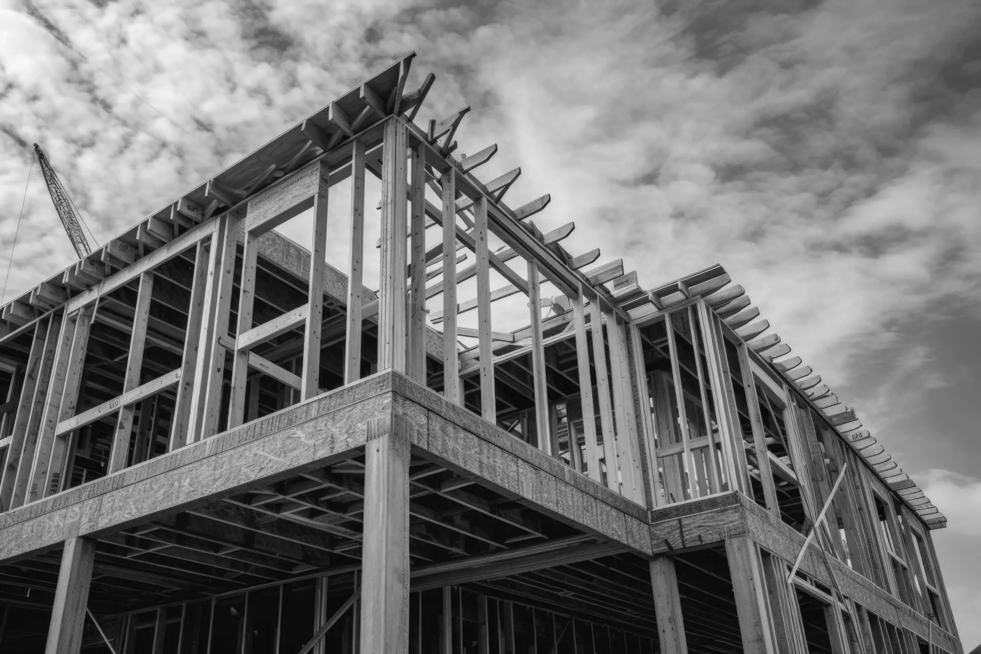 New timber framing for a two-storey home addition under construction